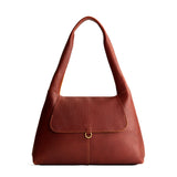 Nutmeg Medium | Slouchy triangle shaped shoulder bag with a flap