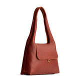 Nutmeg Medium | Slouchy triangle shaped shoulder bag with a flap