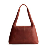 Nutmeg Medium | Slouchy triangle shaped shoulder bag with a flap