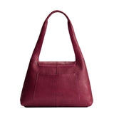 Orchid Medium | Slouchy triangle shaped shoulder bag with a flap