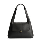 Pebbled--black Medium | Slouchy triangle shaped shoulder bag with a flap