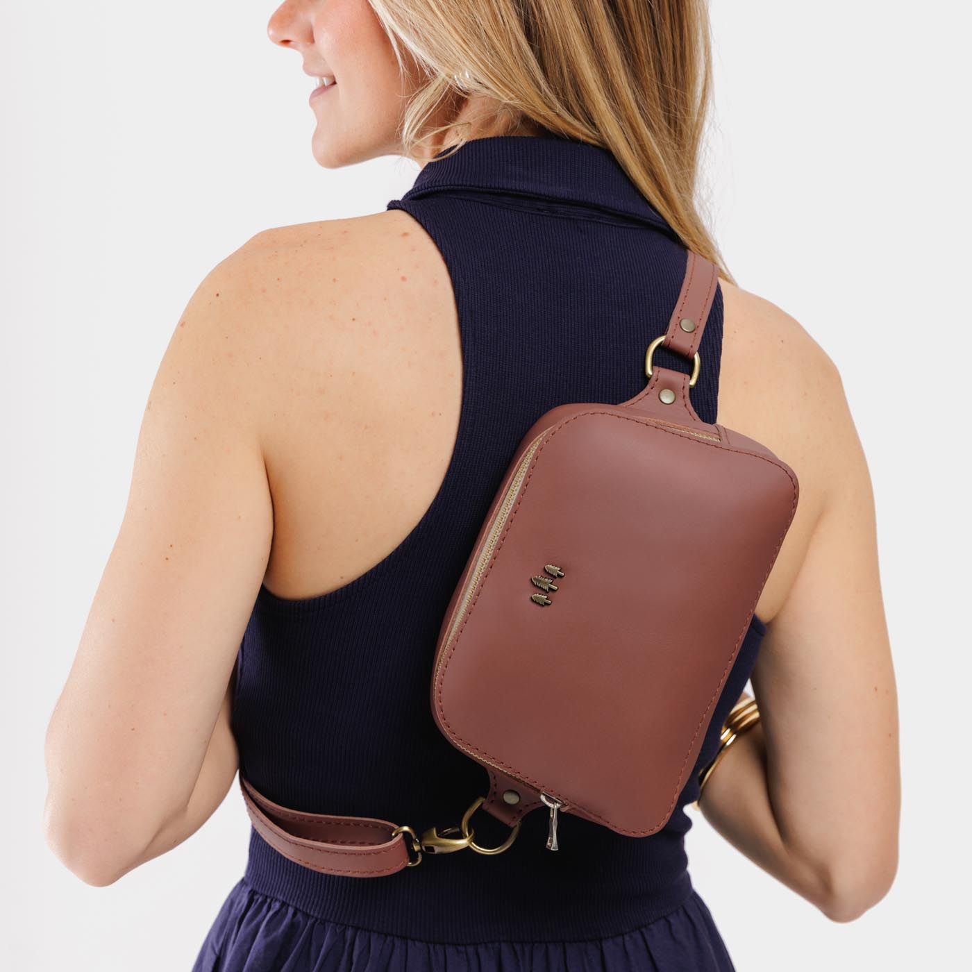 Sunkissed | Model wearing sling bag on back