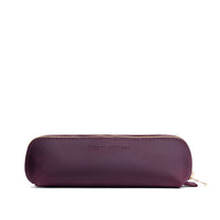 Larkspur | Leather pouch with curved seams and top zipper