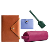 ANY | 4 small goods, a journal, mini bifold wallet, archie tassel, and sushi roll pouch
