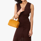 Sunshine Small | Woman holding Sloan Doctor Bag