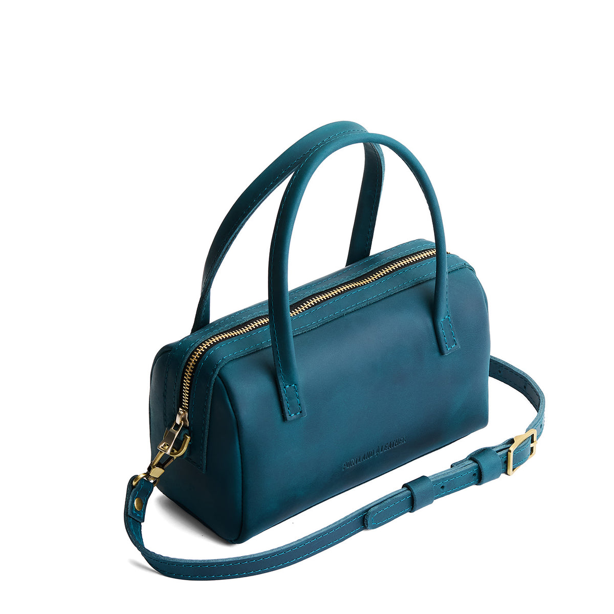Westward Blue*Small | Mini duffle shaped handbag with crossbody strap