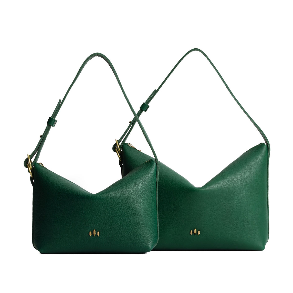 Sm/Lrg Slouchy Shoulder Bag Mystery | Slouchy leather shoulder bag with zipper opening and three metal tree emblems