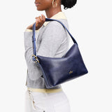 Cobalt Small | Petite slouchy leather shoulder bag with zipper opening and three metal tree emblems