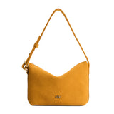 Dijon Small | Slouchy Shoulder Bag that has a zipper opening and three metal tree emblems on a white background