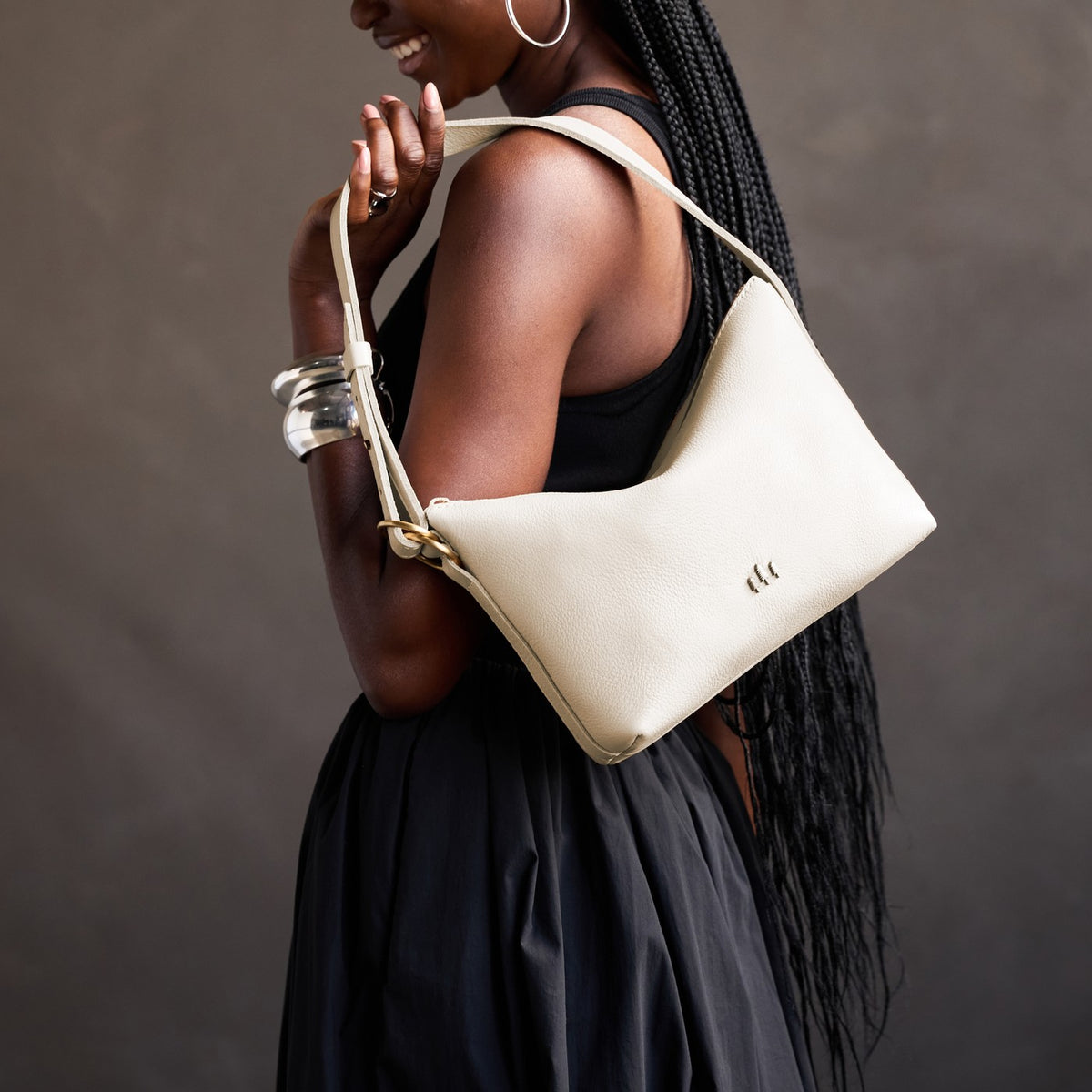 Pebbled Bone*Small | Petite slouchy leather shoulder bag with zipper opening and three metal tree emblems