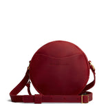 Phoenix Small | Circle shaped crossbody bag with top zipper