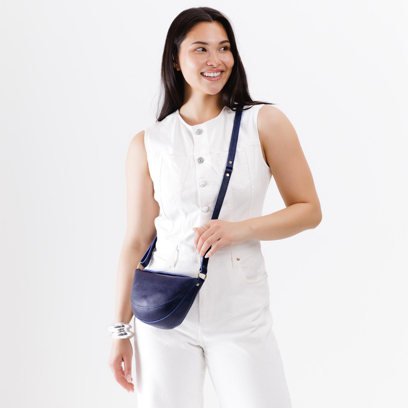Cobalt*Small | Model wearing petite half circle shaped sling bag