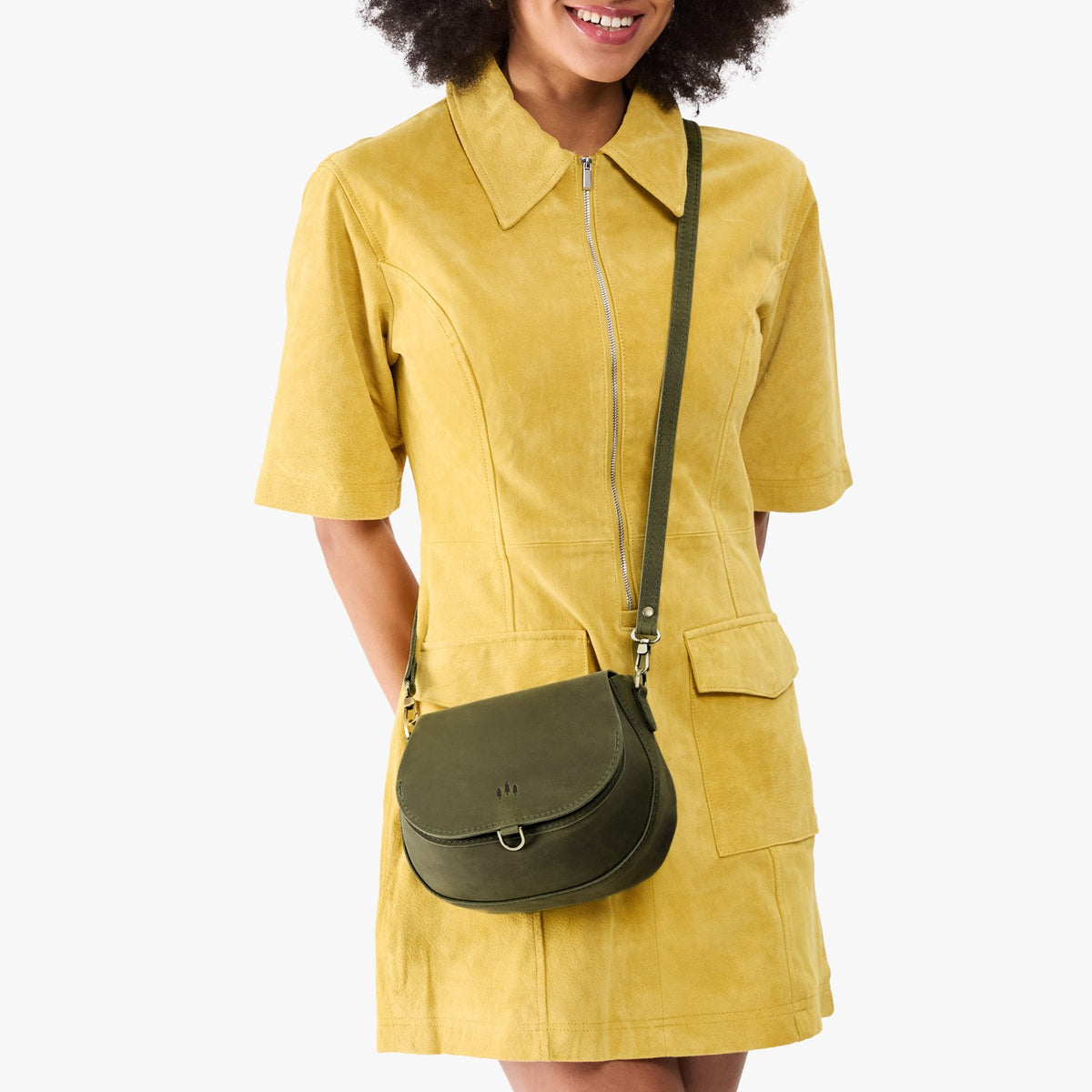 Old Growth*Small | Model wearing a leather Crossbody with a flap and magnetic closure