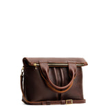 Coldbrew Small | Convertible tote clutch crossbody with two large front pocket and top carry handles folded into a clutch