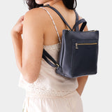 Night Owl Small | Model wearing square slim leather tote backpack 