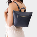Night Owl Small | Model wearing square slim leather tote backpack 