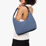 Denim Small Classic | U-shaped shoulder bag with adjustable strap and fringe detail