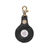 Pebbled--black | Round leather AirTag holder with snap closure and swivel lobster claw clasp