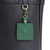 Bacalar | Square-shaped leather AirTag holder with snap closure and swivel lobster claw clasp