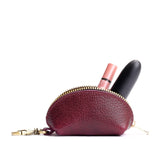Orchid | Taco shaped leather pouch with zipper and swivel lobster clasp on white background