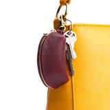Orchid | Taco shaped leather pouch with zipper and swivel lobster clasp on bag