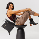 All Color: Black Large | Model wearing square slim leather tote backpack