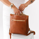 All Color: Honey Large | Model holding square slim leather tote backpack