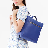 Molino Blue Large | Model wearing square slim leather tote backpack