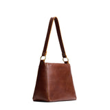 Asheville Small | Triangular shoulder bag with antiqued brass finished hardware