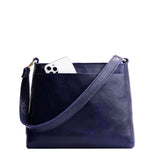 Cobalt Small | Triangular shoulder bag with antiqued brass finished hardware