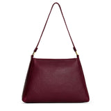 Cabernet Large | Large triangular shoulder bag with antiqued brass finished hardware