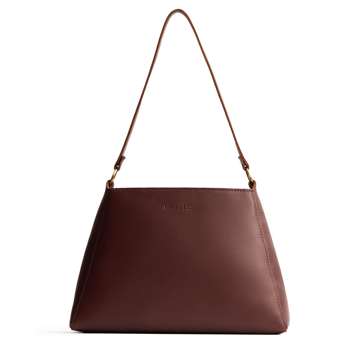 Cognac*Large | Large triangular shoulder bag with antiqued brass finished hardware