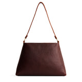 Coldbrew Large | Large triangular shoulder bag with antiqued brass finished hardware