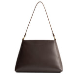 Grizzly Large | Large triangular shoulder bag with antiqued brass finished hardware