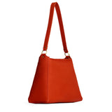 Paprika Large | Large triangular shoulder bag with antiqued brass finished hardware