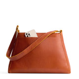 Sienna Large | Large triangular shoulder bag with antiqued brass finished hardware