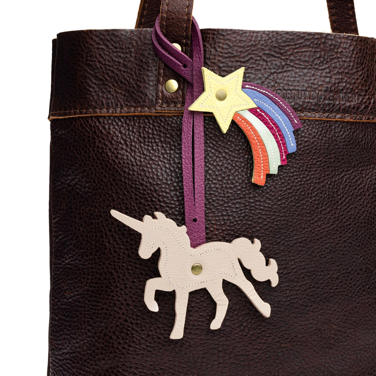 Pebbled Bone | Unicorn and Shooting star duel ended tassel 