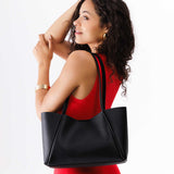 Black Medium | Model holding midsize rectangular tote bag