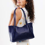 Cobalt Medium | Model holding midsize rectangular tote bag