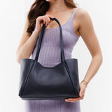 Night Owl Medium | Model holding midsize rectangular tote bag