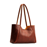 Nutmeg Medium | Wide tote with leather straps and snap closure