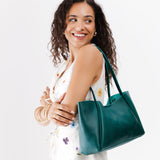 Sea Glass Medium | Model holding midsize rectangular tote bag