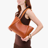 Sienna Medium | Model holding midsize rectangular tote bag