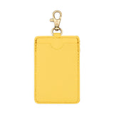 Canary | A leather card holder with a swivel lobster clasp on a white background