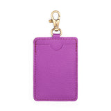 Cattleya | A leather card holder with a swivel lobster clasp on a white background