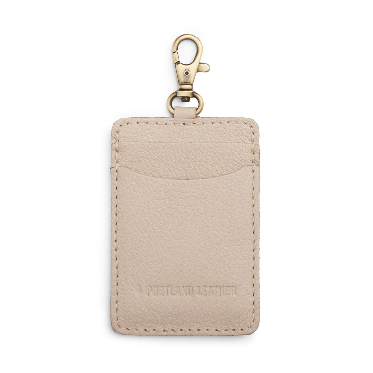 Pebbled Bone | A leather card holder with a swivel lobster clasp on a white background