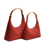 Cinnabar | Classic size comparison of a U-shaped shoulder bag with adjustable strap