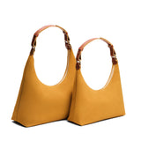 Dijon | Classic size comparison of a U-shaped shoulder bag with adjustable strap