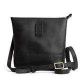 Black | Small rectangular crossbody purse with top zipper and interior pocket