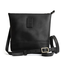Black | Small rectangular crossbody purse with top zipper and interior pocket